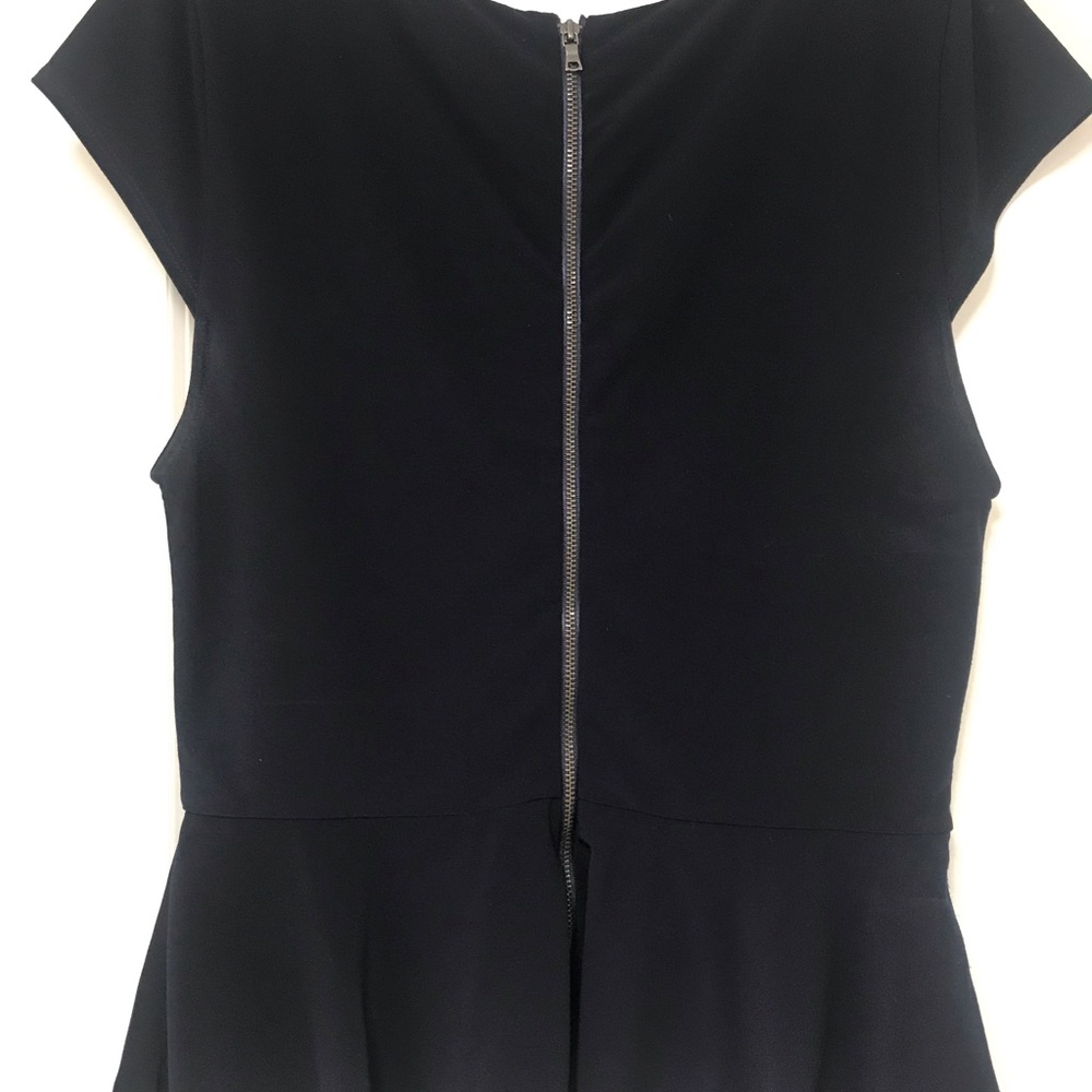 Alice and Olivia Peplum style top.